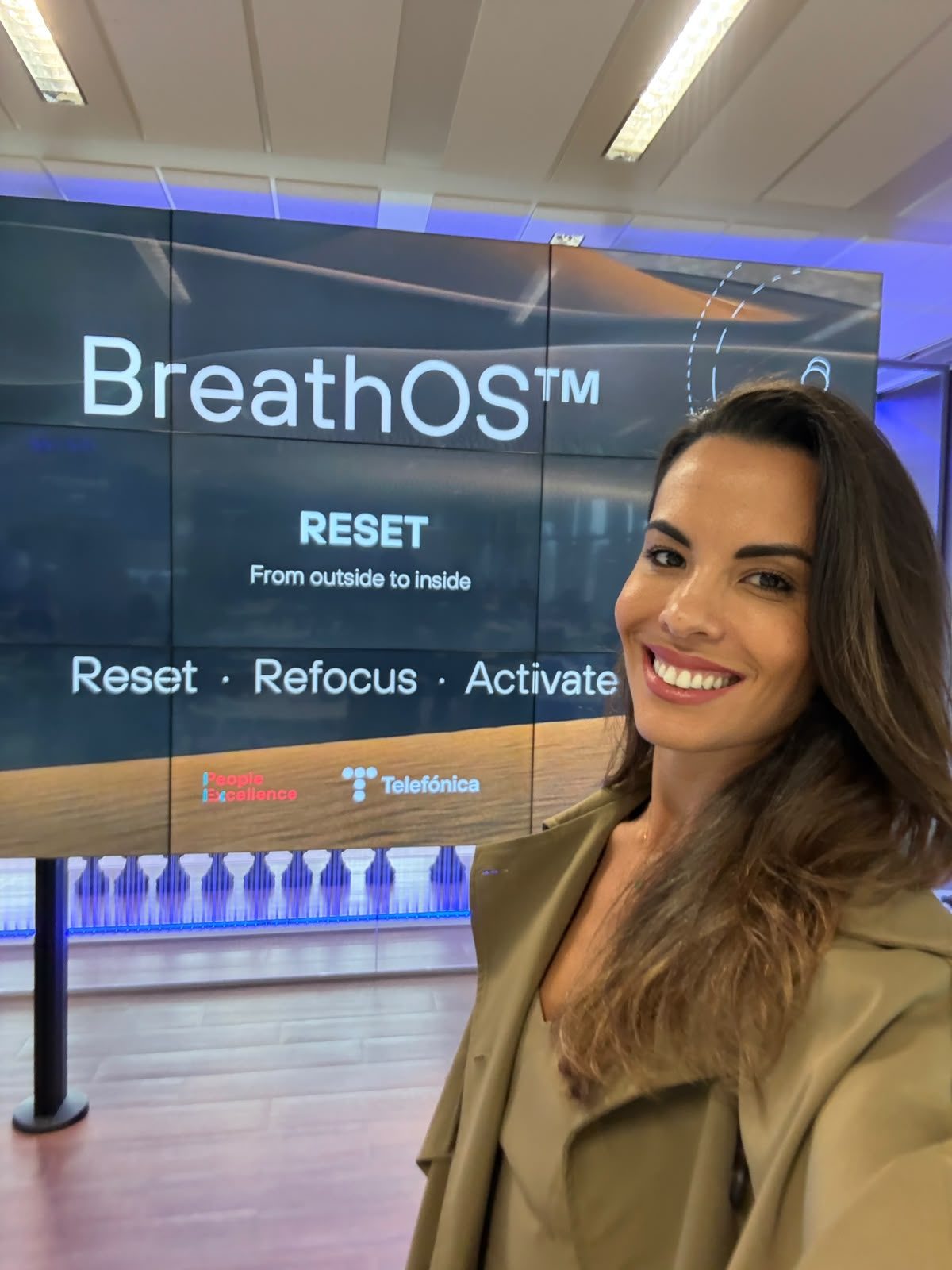 Amanda at Telefónica with BreathOS on screen